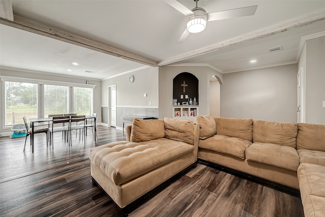 living room with crown molding, beam ceiling, and wood-type flooring