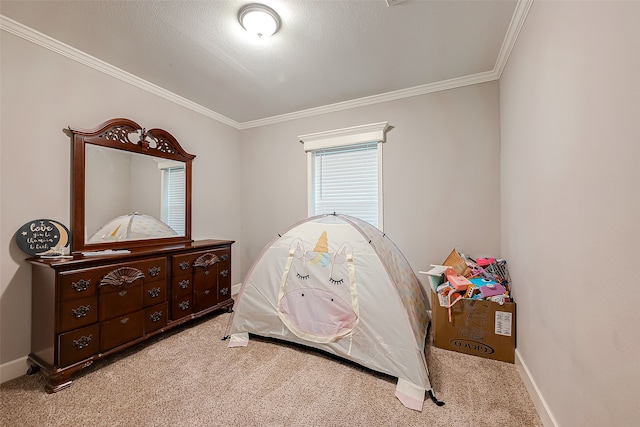 bedroom with crown molding, light carpet, and a textured ceiling