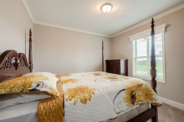 bedroom featuring crown molding and carpet floors