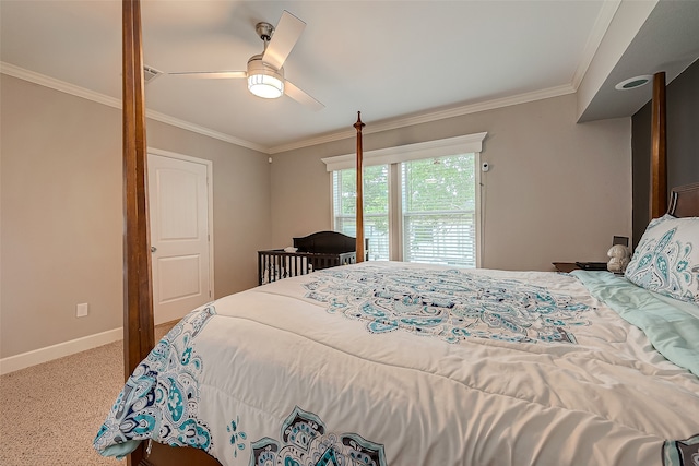 carpeted bedroom with crown molding and ceiling fan