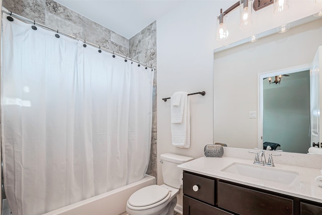 full bathroom featuring shower / tub combo with curtain, vanity, and toilet