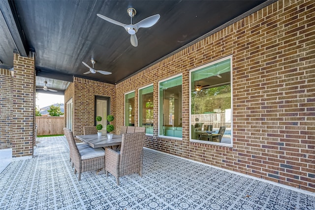 view of patio with ceiling fan