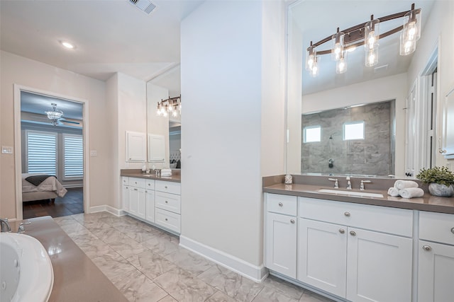 bathroom featuring vanity and a tile shower