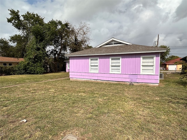 view of home's exterior featuring a lawn