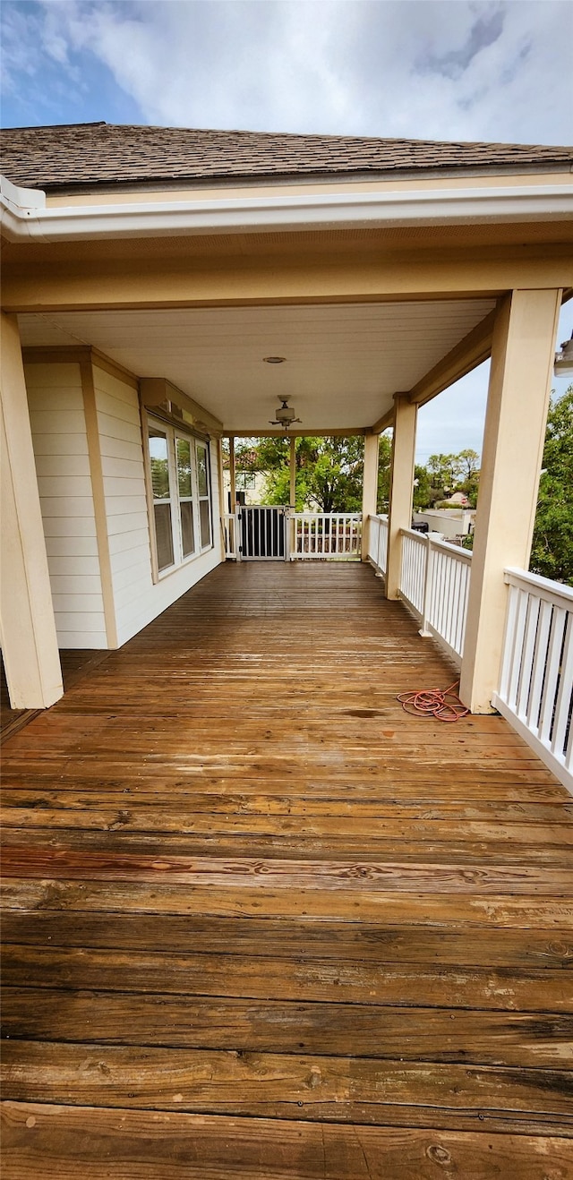 wooden terrace with ceiling fan