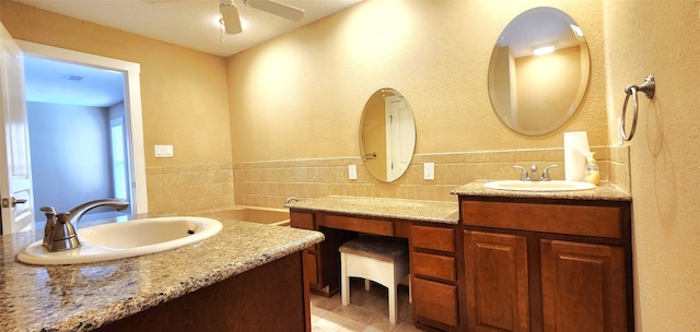 bathroom featuring vanity, ceiling fan, and tile patterned flooring