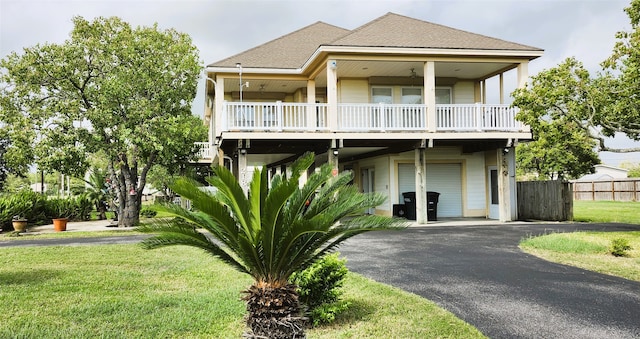 coastal home with a front lawn