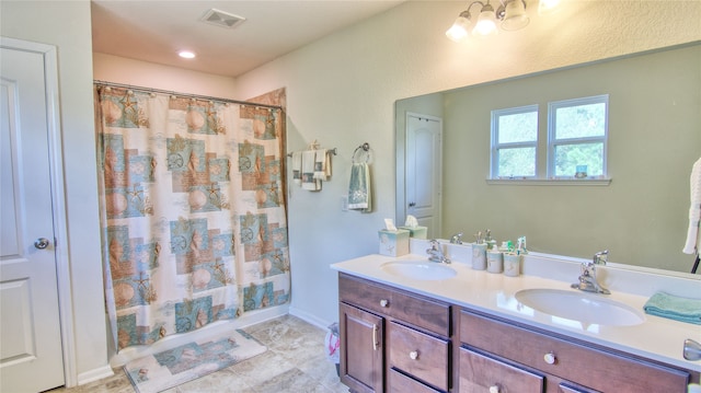 bathroom with vanity and shower / tub combo