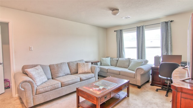 living room featuring light carpet