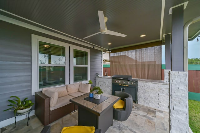 view of patio / terrace featuring an outdoor hangout area, grilling area, sink, and ceiling fan