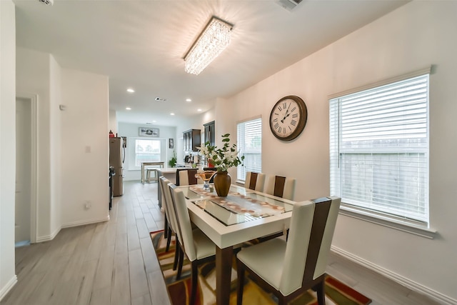 dining room featuring light hardwood / wood-style floors