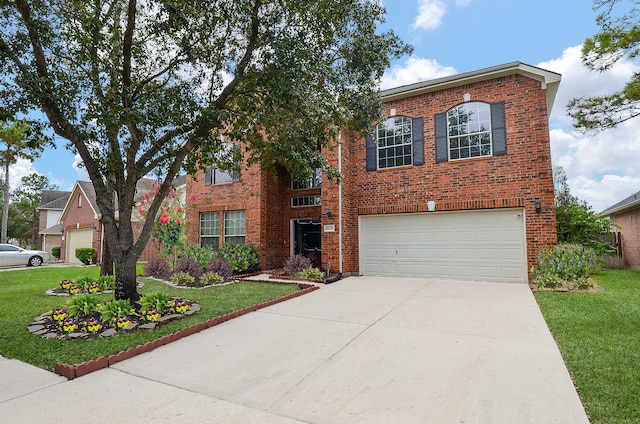 view of front facade featuring a garage and a front lawn