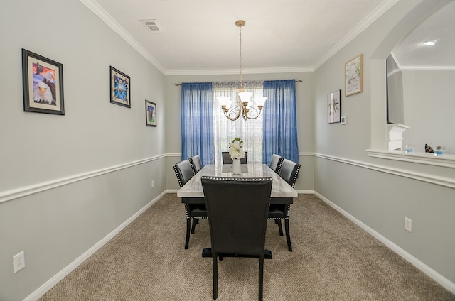 carpeted dining room with ornamental molding and an inviting chandelier