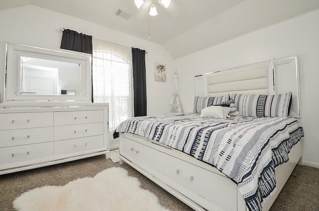 carpeted bedroom featuring ceiling fan and lofted ceiling