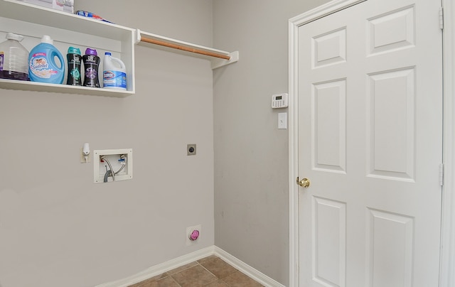 laundry room with hookup for a washing machine, electric dryer hookup, and tile patterned flooring