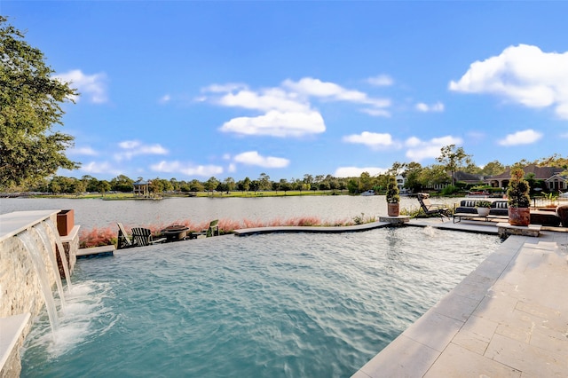 view of pool with a water view