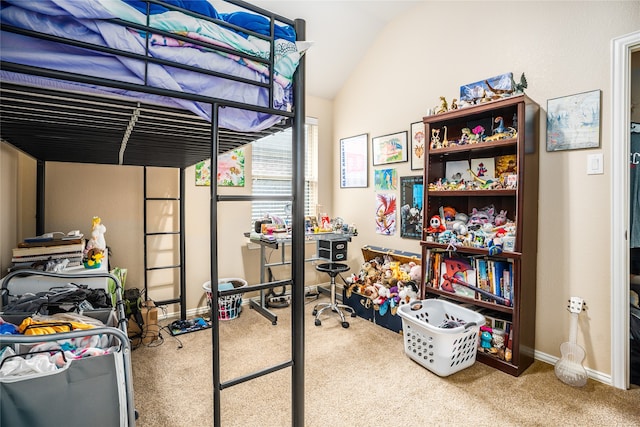 carpeted bedroom with vaulted ceiling