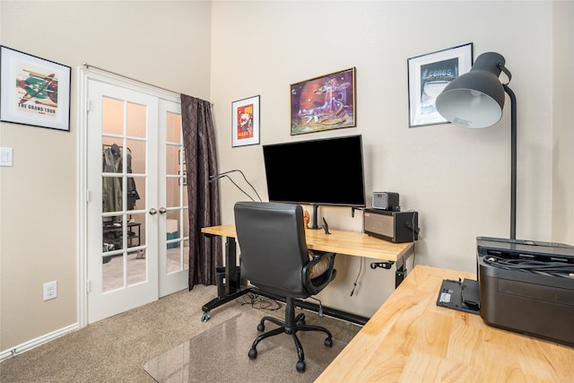 home office with french doors and carpet flooring