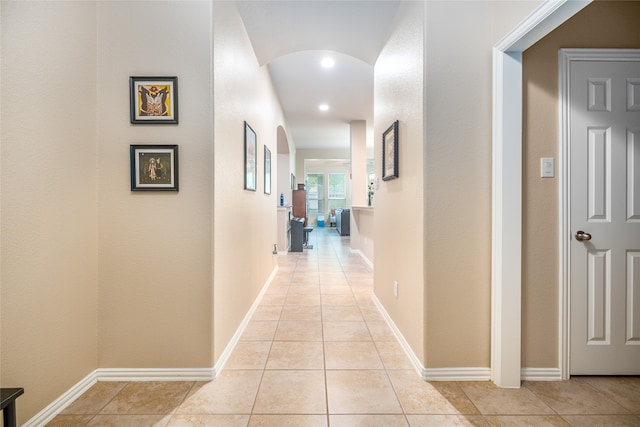 hallway with light tile patterned floors