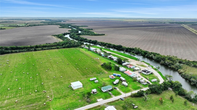 bird's eye view featuring a water view and a rural view