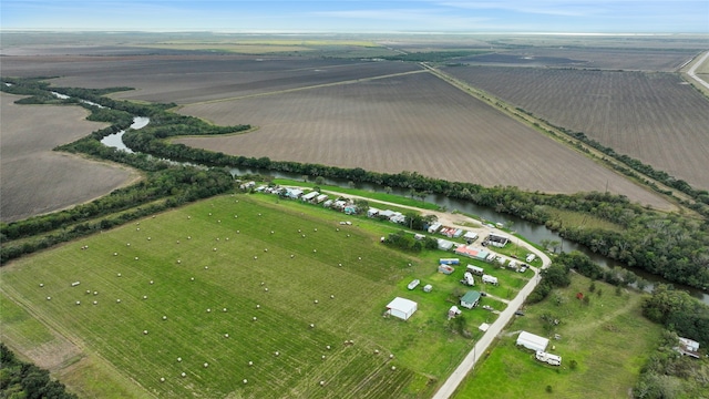 aerial view featuring a rural view and a water view