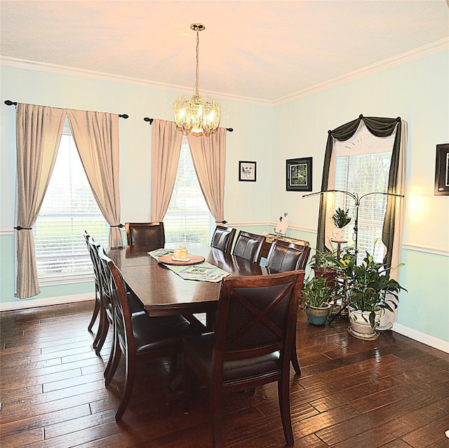 dining area with dark hardwood / wood-style flooring and crown molding