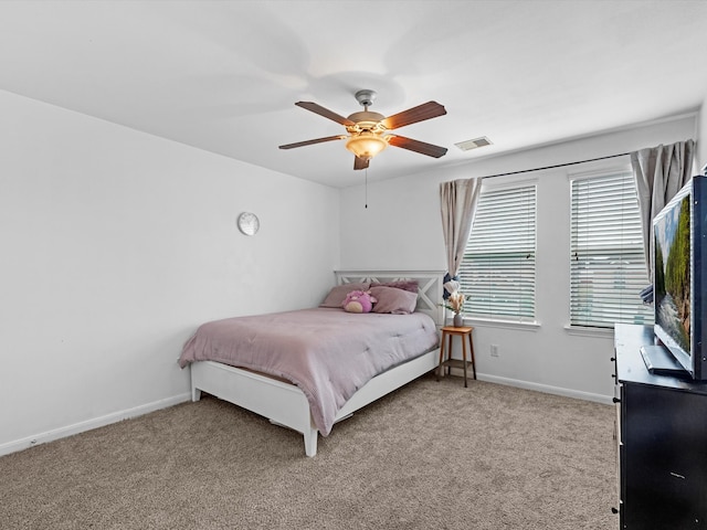 carpeted bedroom featuring ceiling fan