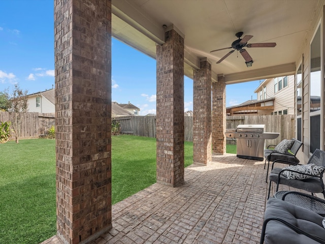 view of patio / terrace featuring grilling area and ceiling fan