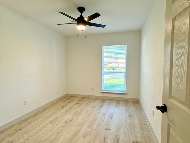 spare room with ceiling fan and light hardwood / wood-style floors