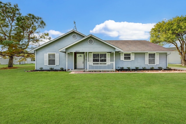 single story home featuring a front yard and a porch