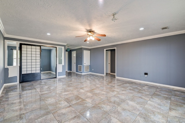 spare room with crown molding, a textured ceiling, and ceiling fan