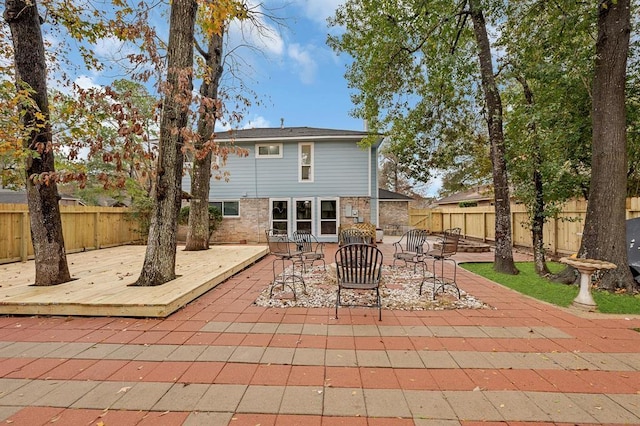 rear view of house featuring a patio area