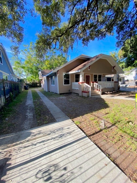 bungalow-style home with a porch