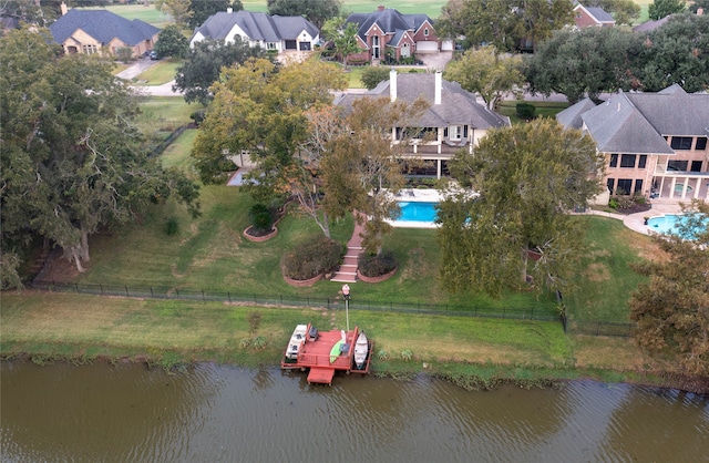 drone / aerial view with a water view