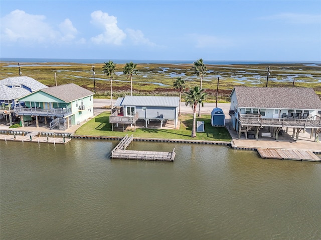 drone / aerial view featuring a water view