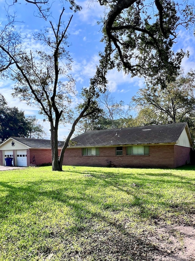 view of yard with a garage