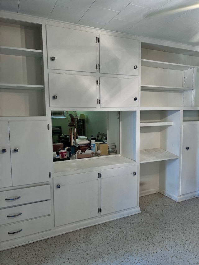 interior space with white cabinetry