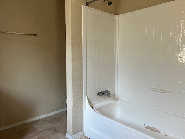 bathroom with bathing tub / shower combination