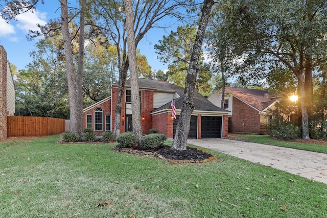 view of front facade featuring a front lawn and a garage