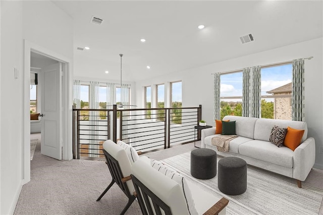 living room featuring light colored carpet