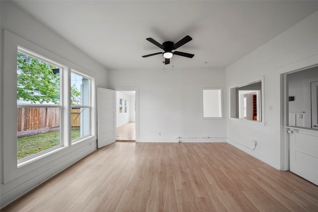 interior space featuring light wood-type flooring and ceiling fan