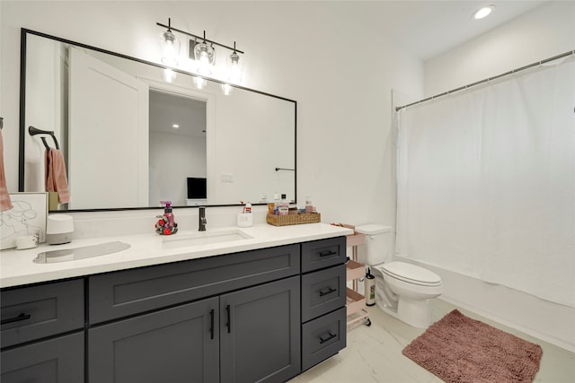 full bathroom featuring vanity, shower / bath combo with shower curtain, and toilet