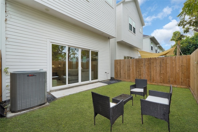 view of yard featuring central AC unit