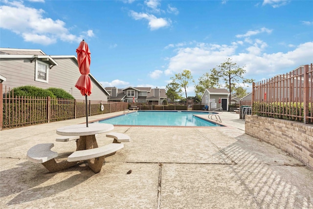 view of pool featuring a patio