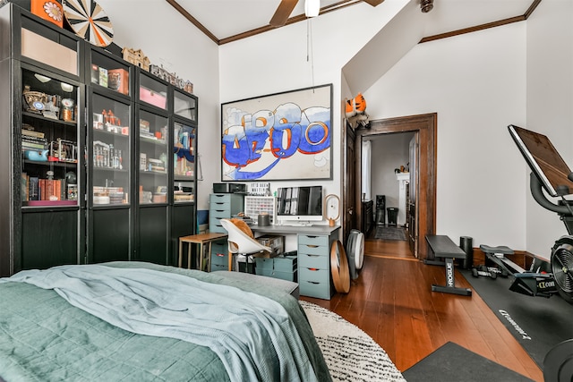bedroom with dark wood-type flooring and ornamental molding