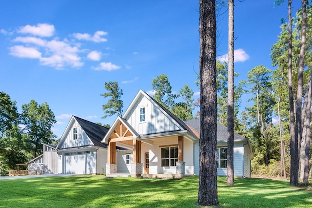 view of front of house featuring a front yard and covered porch