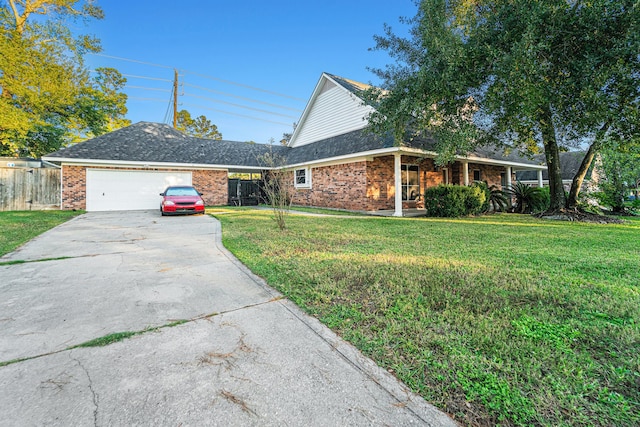 view of front facade with a garage and a front yard