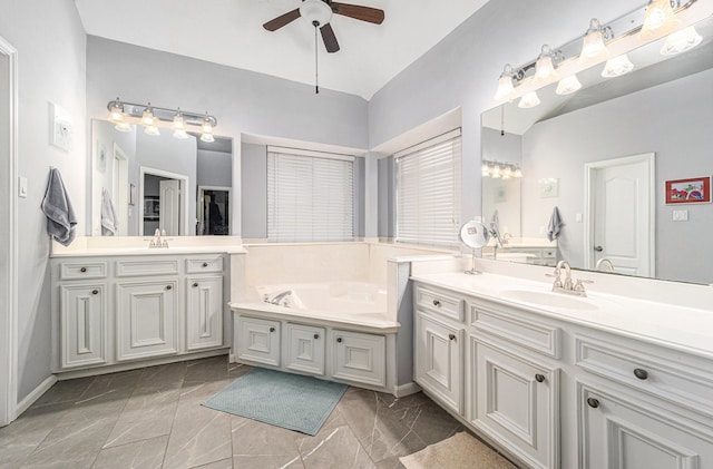 bathroom featuring ceiling fan and vanity