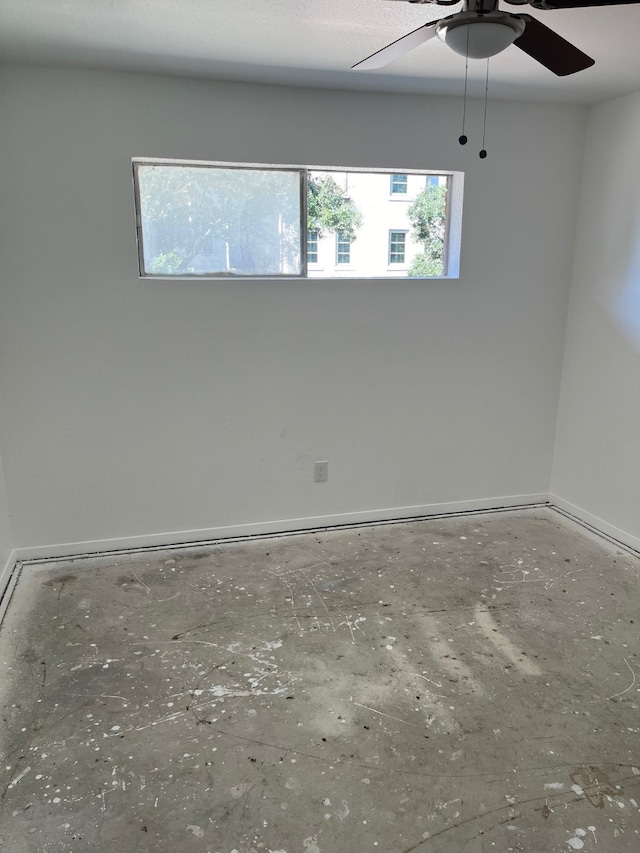 spare room featuring ceiling fan