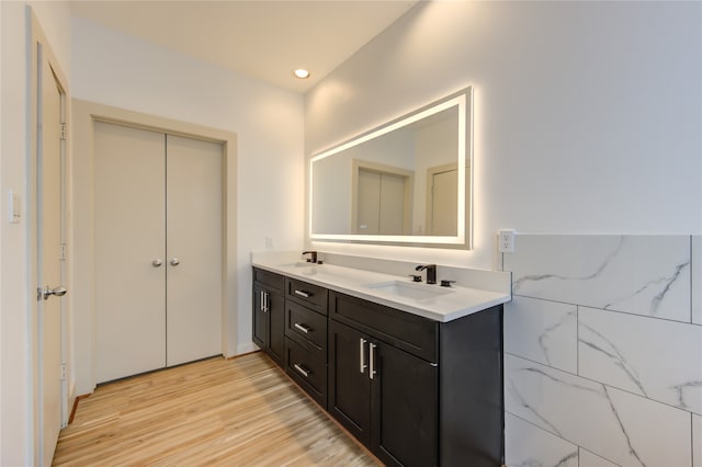 bathroom featuring vanity and wood-type flooring